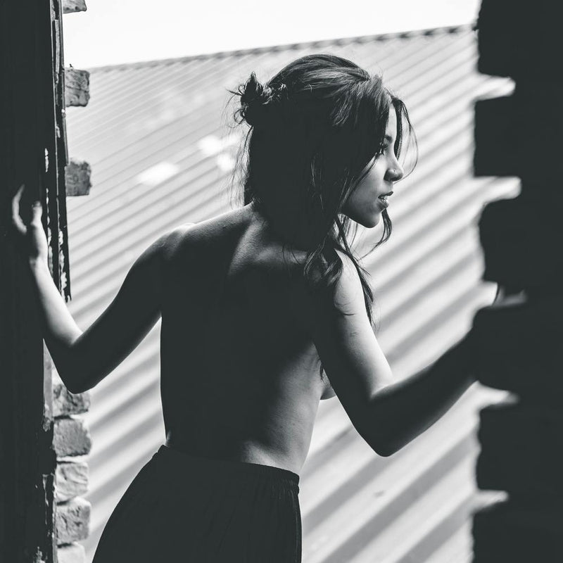 Girl In A Window