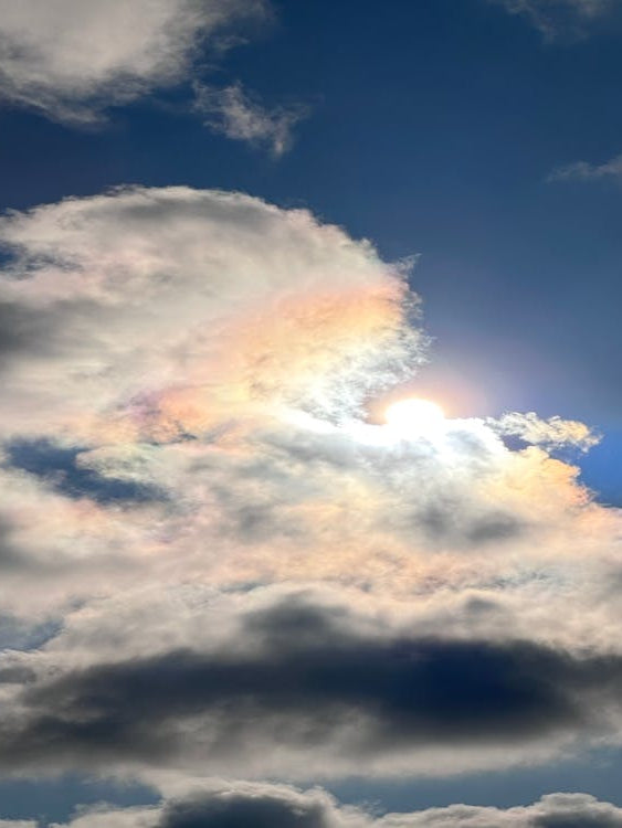 Sun Shining Through Clouds Photo
