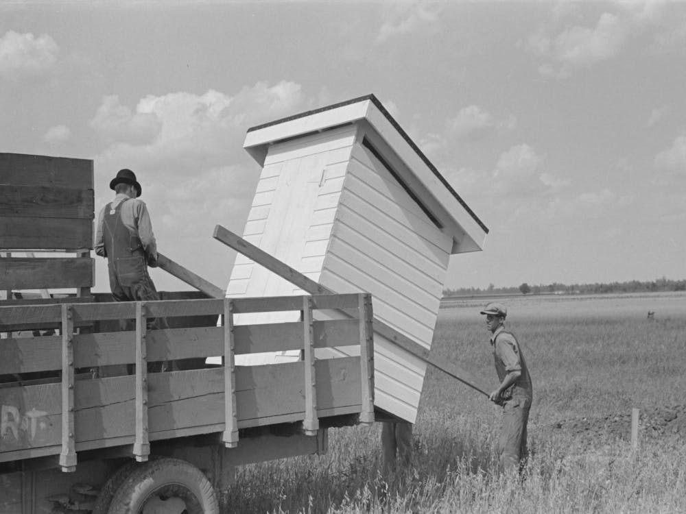 Southeast Missouri Farms Project, Unloading Privy House At Job Site By Russell Lee