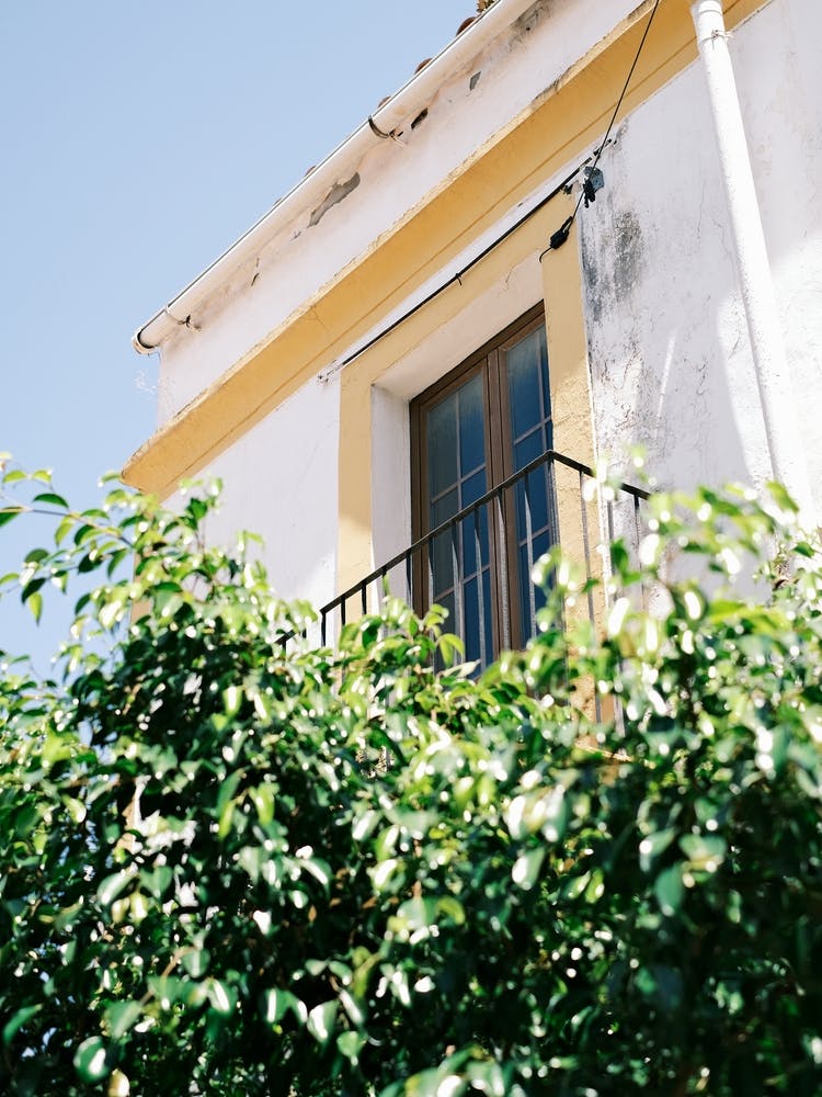 White house with Yellow Window // Ibiza Travel Photography