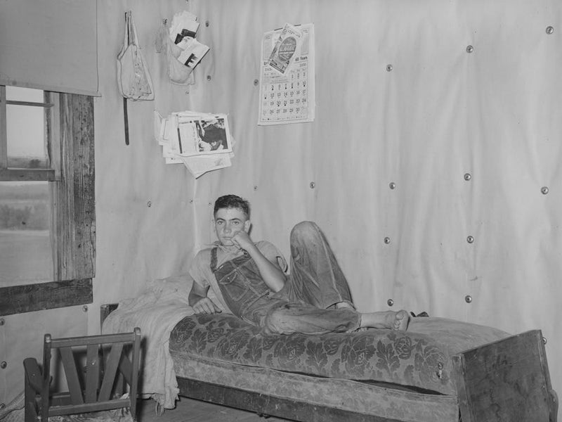 Son Of Woman Tenant Farmer On Daybed In Corner Of Living Room Near Sallisaw, Oklahoma By Russell Lee