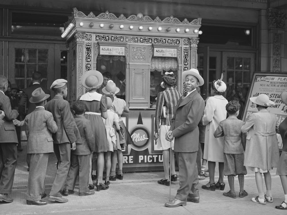 In Front Of The Movie Theater, Chicago, Illinois By Russell Lee