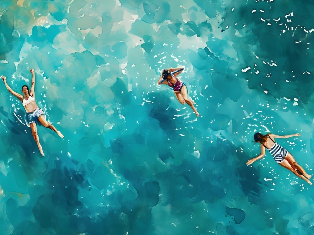 Three People Swimming In The Ocean