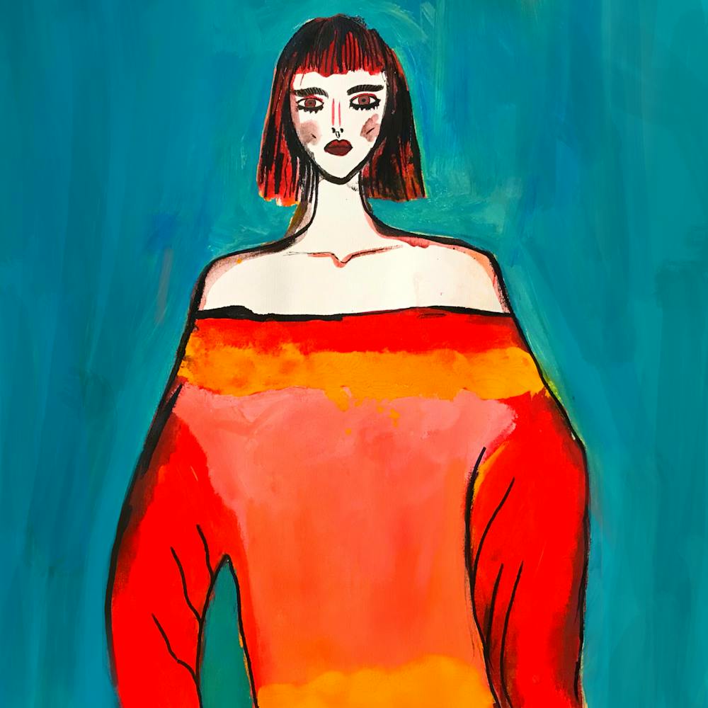 Frau in einem orangefarbenen Pullover