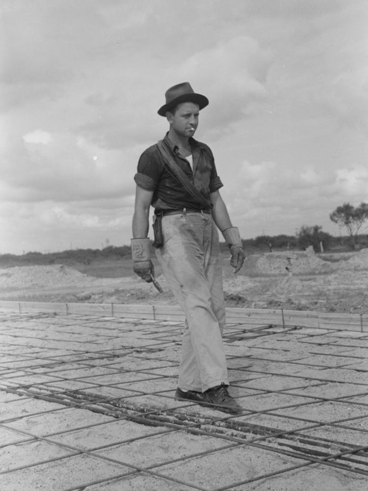 Untitled Photo, Possibly Related To Fitting Water Pipe At Migrant Camp Under Construction At Sinton, Texas By Russ