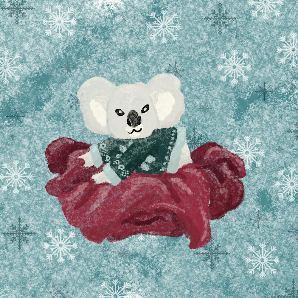Christmas Koala in a blanket