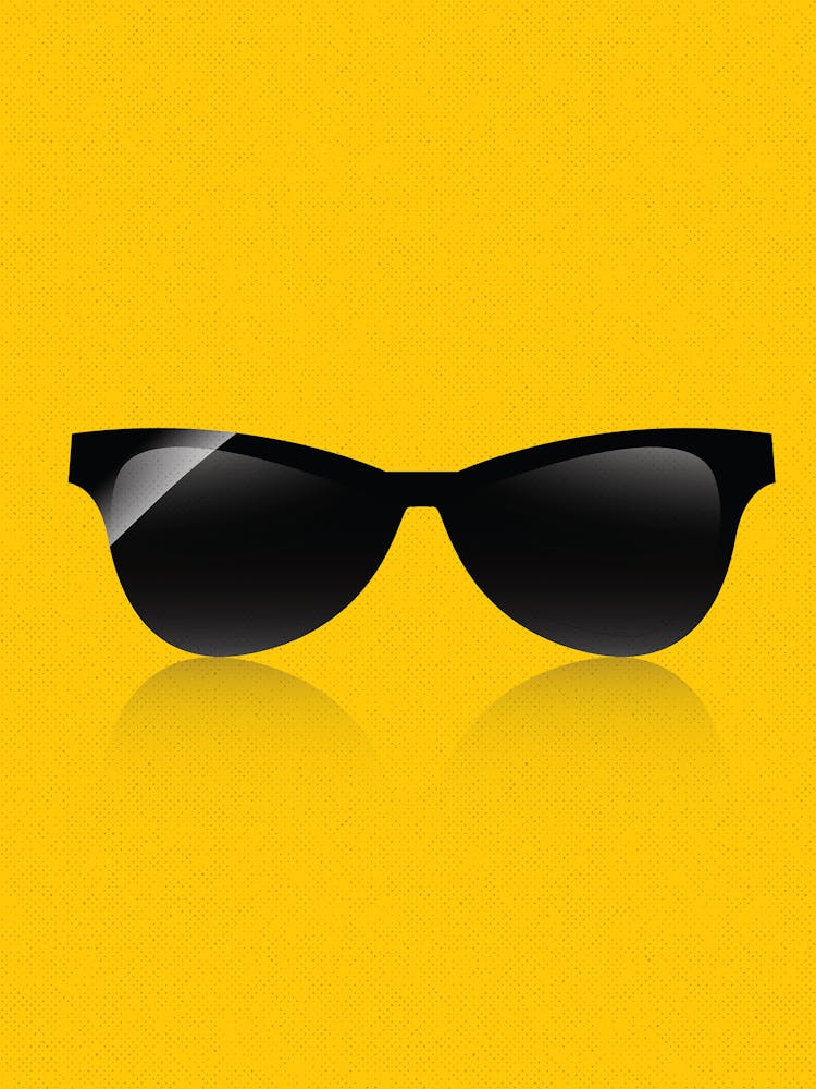 Sunglasses On A Yellow Background