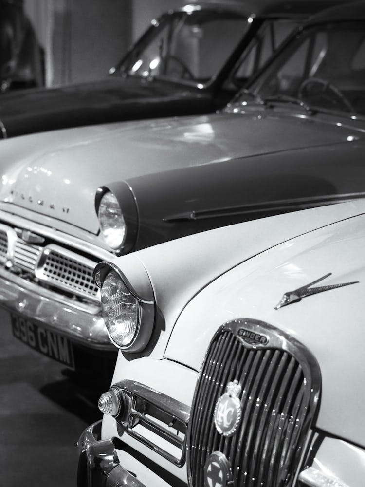 Black And White Photograph Of Classic Cars