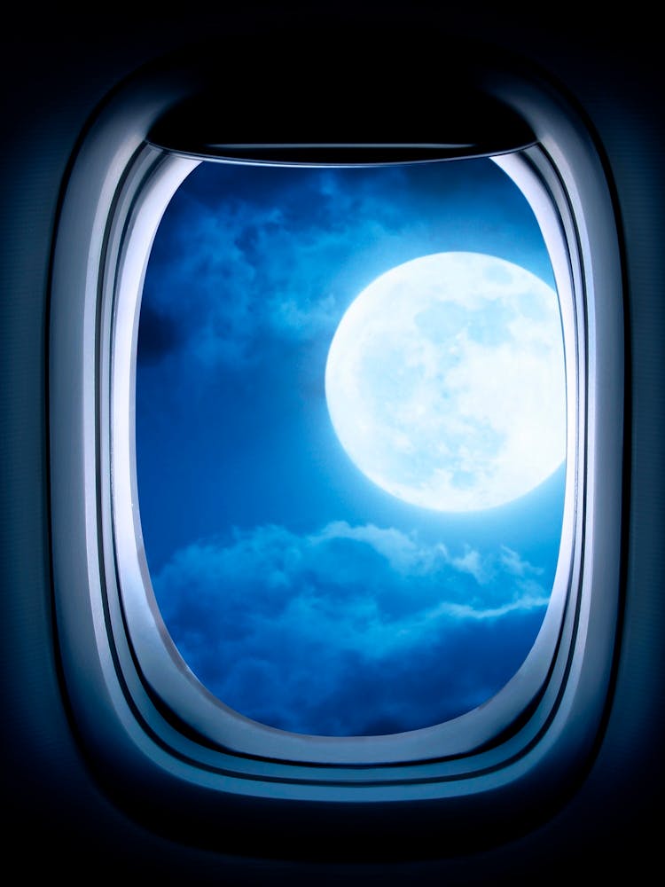 Airplane window with Moon, porthole #6