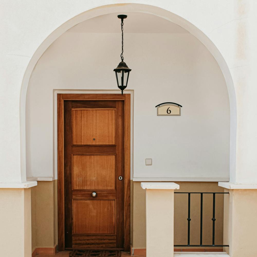 The Brown Door In Spain Travel Square