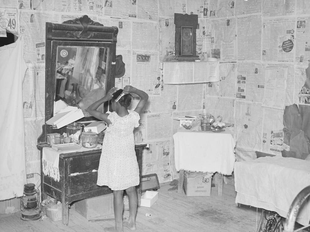 Southeast Missouri Farms, Sharecropper S Child Combing Hair In Bedroom Of Shack Home Near La Forg