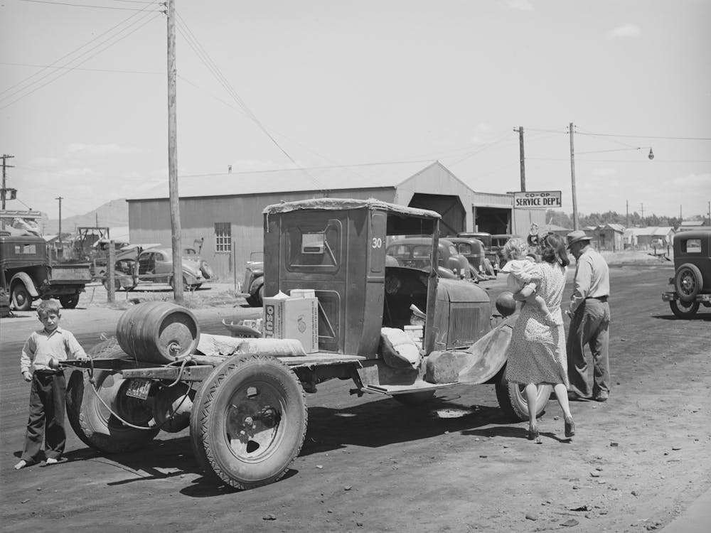 Farmer With His Truck Loaded With Goods Which He Has Bought From The United Producers And Consumers Cooperative