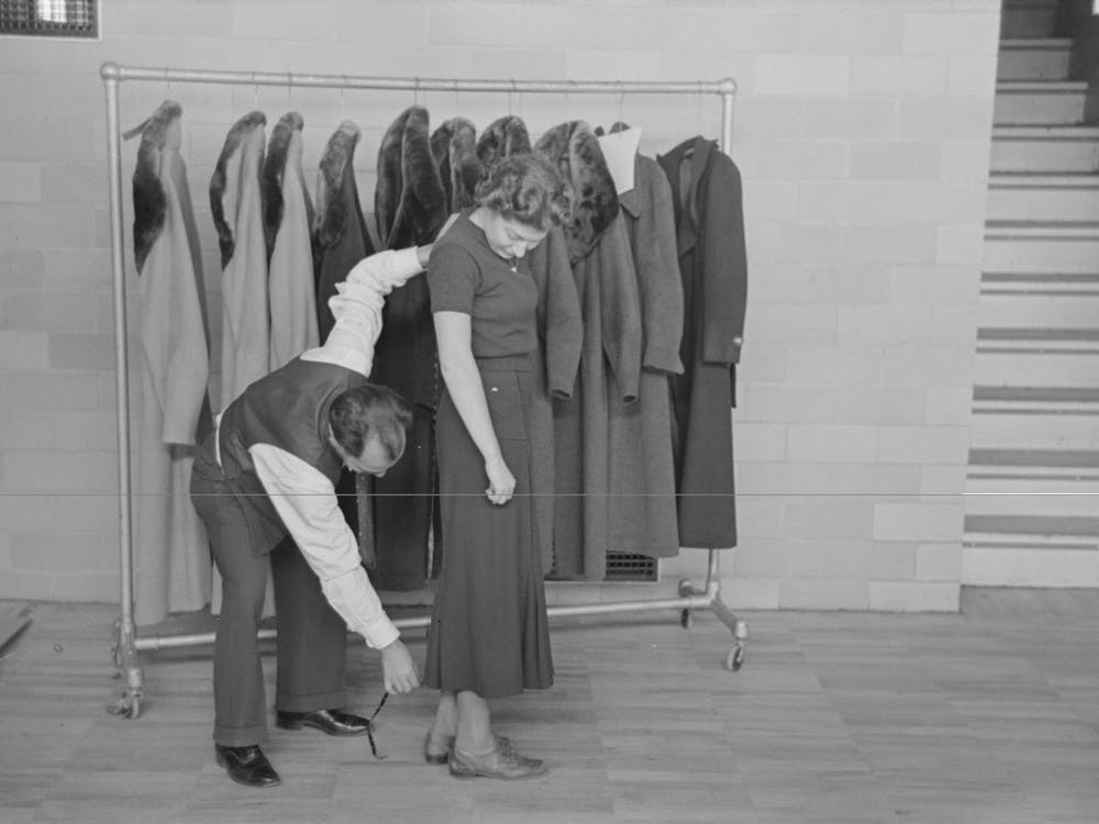Untitled Photo, Possibly Related To Measuring Girl For A Coat In Cooperative Garment Factory At Jersey Homesteads,