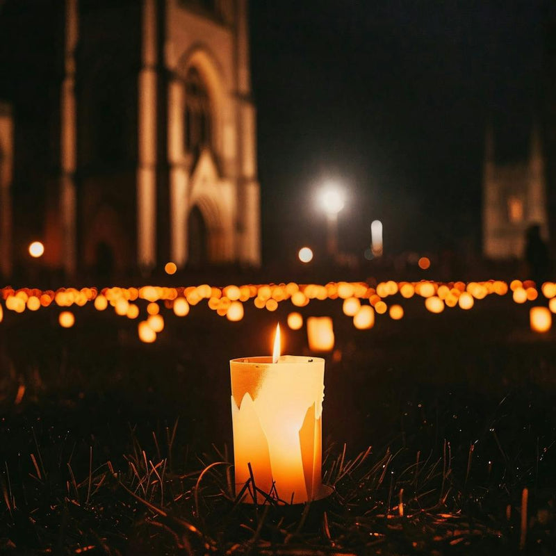 Lit Candle In Front Of Church 1