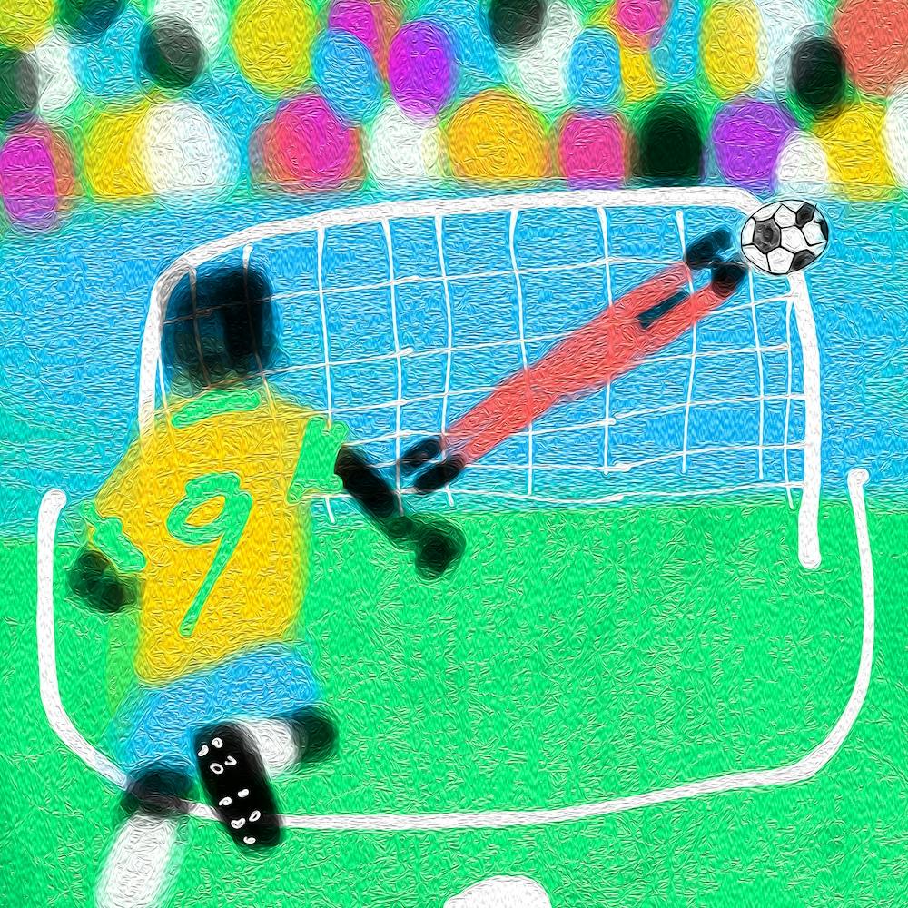 Soccer Player Kicking The Ball