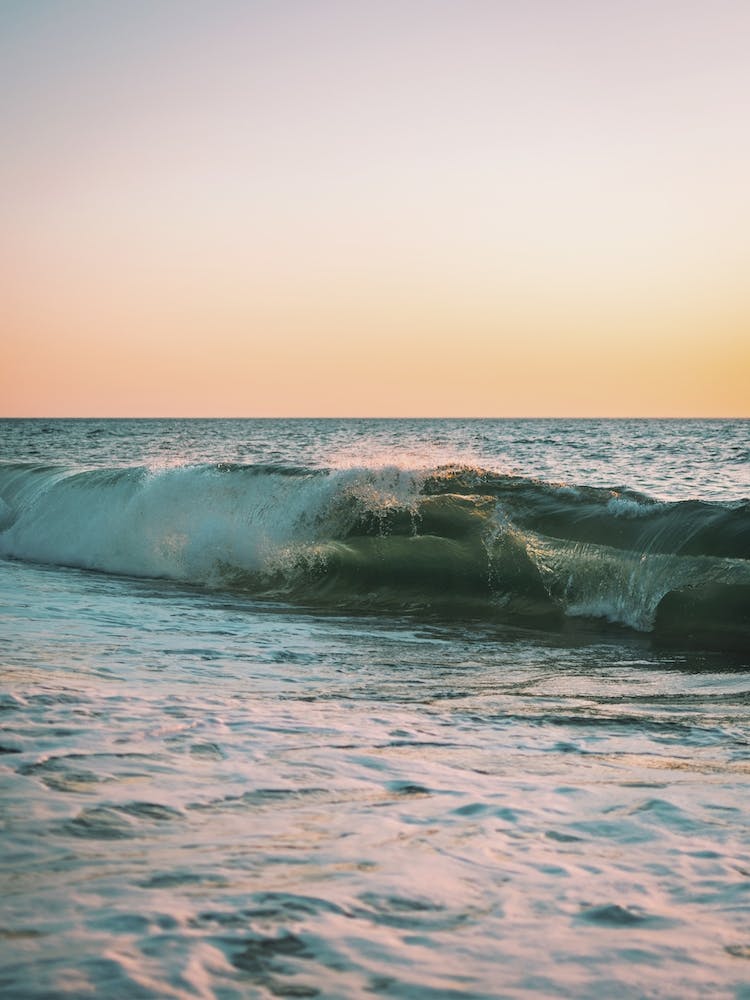 Waves At Sunset