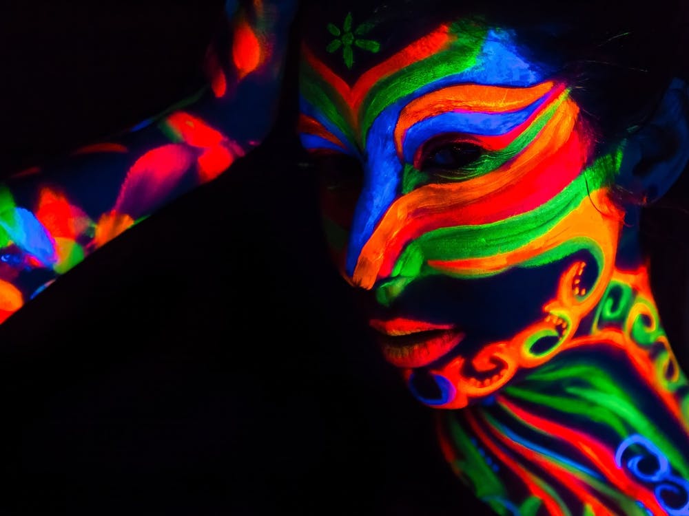 Woman With Make Up Art Of Glowing Uv Fluorescent Powder 1