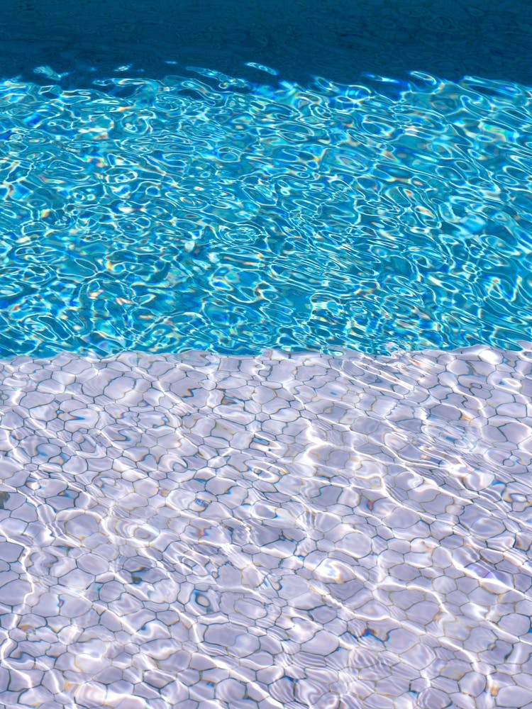 Pink Blue Water in Swimmingpool At Ibiza during Summer