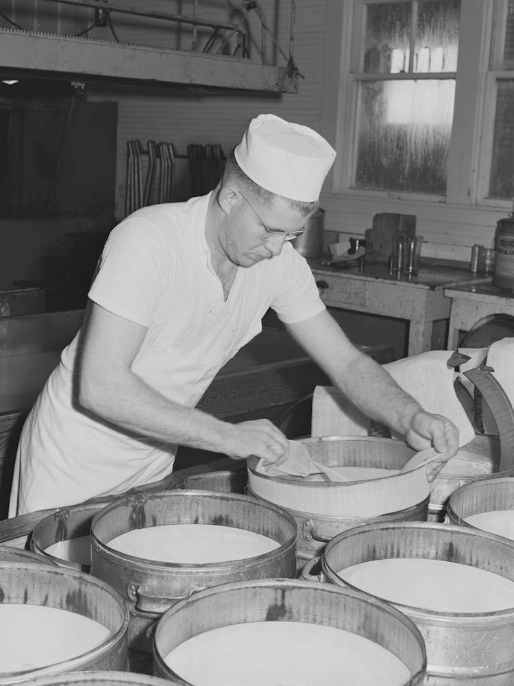 Lining With Cheesecloth The Molds In Which Cheese Will Be Pressed, Tillamook Cheese Plant, Tillamook, Oregon By