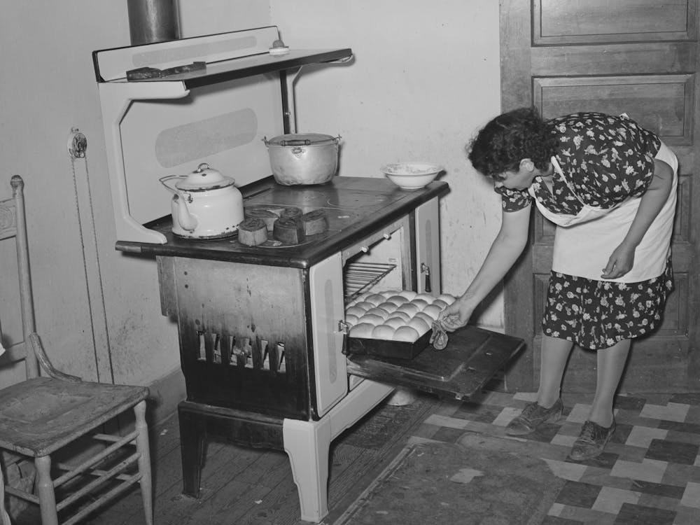 Spanish American Woman Removing Baked Bread From Oven Farm Near Taos, New Mexico By Russell Lee