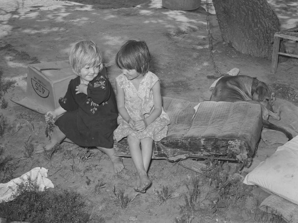 Children Of Agricultural Day Laborer Sitting On An Old Automobile Seat Cushion On Poteau Creek Near Spiro