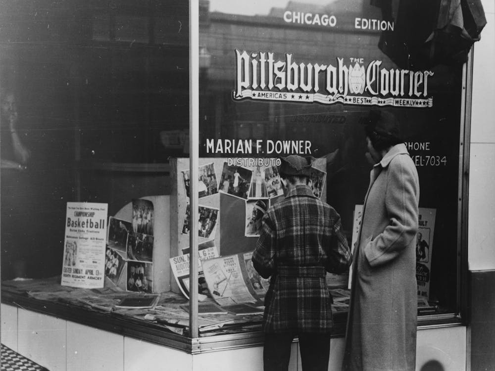 The Pittsburgh Courier Is Widely Read In The Section Of Chicago, Illinois By Russell Lee