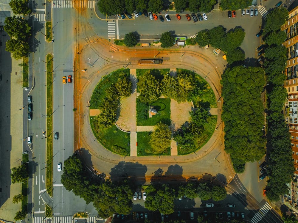 City park surrounded by roads and tram tracks photo from a drone