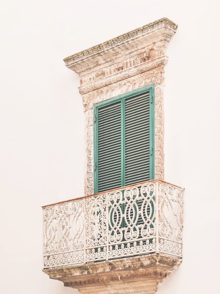 Puglia, Italy I Minimalist window with green shutters in Italian architecture photography for la dolce vita as in Rome Milan Florence or Venice with retro vintage pastel aesthetic during italian summer