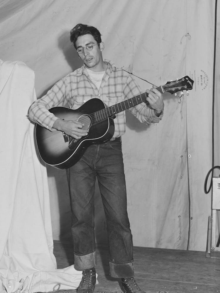 Singing Cowboy Songs At Entertainment At The Fsa (Farm Security Administration) Mobile Camp For