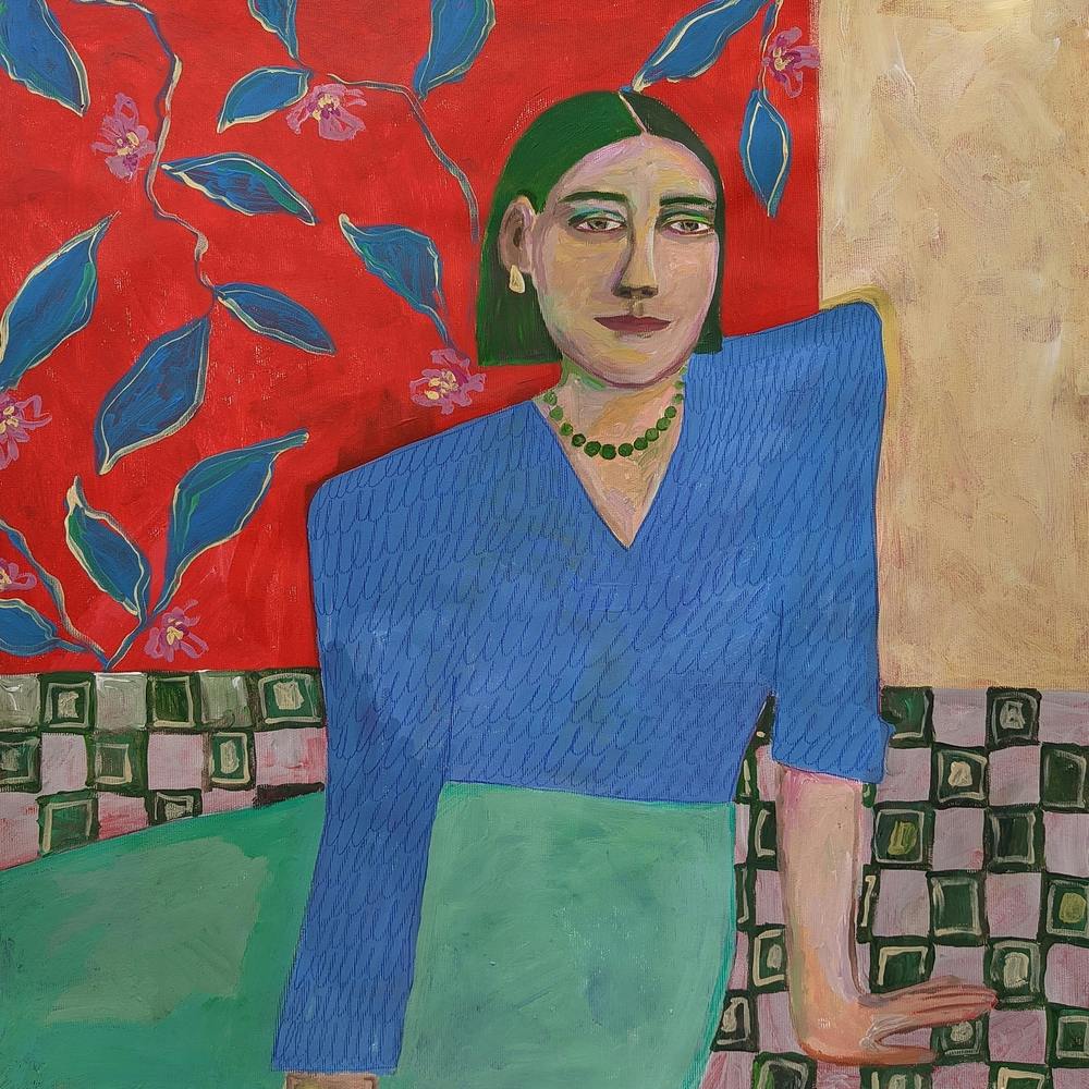 A woman in a blue sweater in the garden