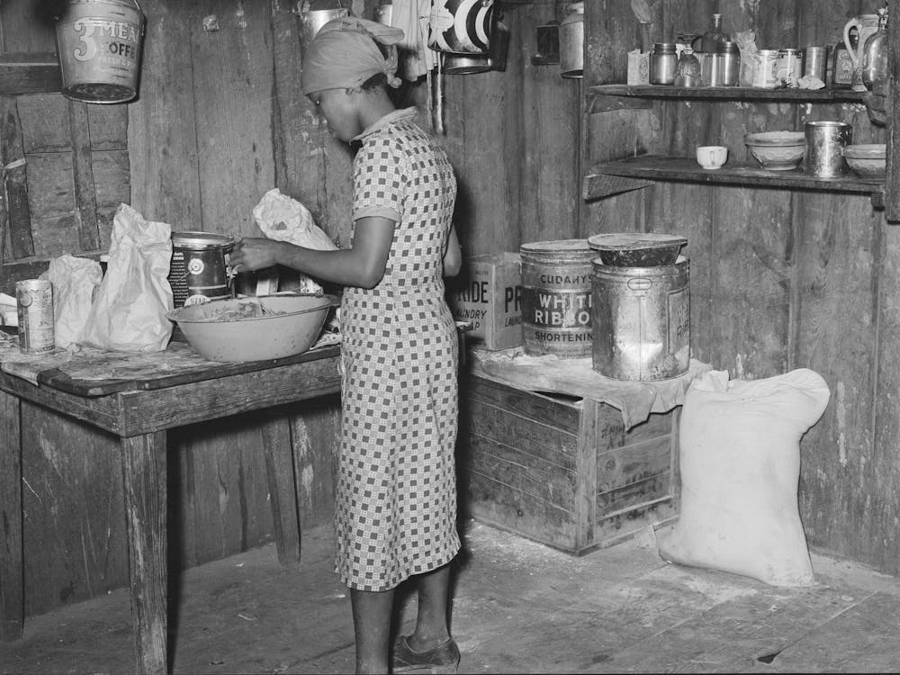 Woman Living On Farm Near Jefferson, Texas, Preparing Dinner By Russell Lee