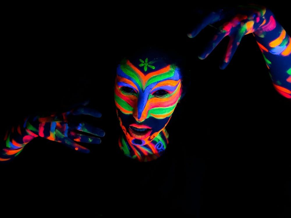 Woman With Make Up Art Of Glowing Uv Fluorescent Powder 9