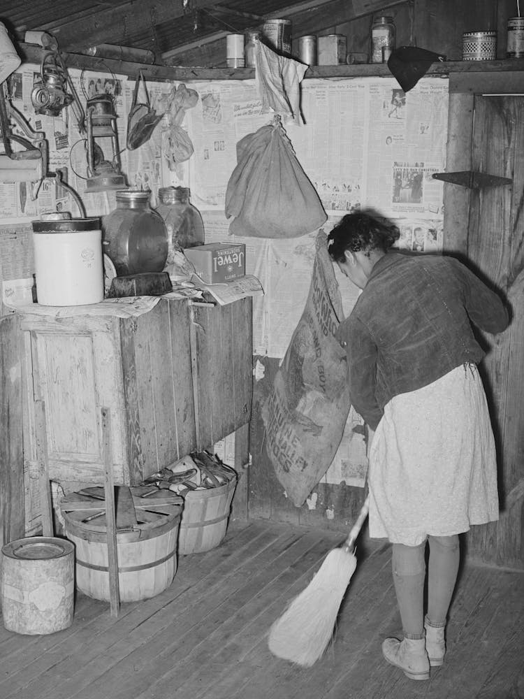 Daughter Of Pomp Hall, Tenant Farmer, Sweeping The Kitchen Floor Creek County, Oklahoma, See General Caption