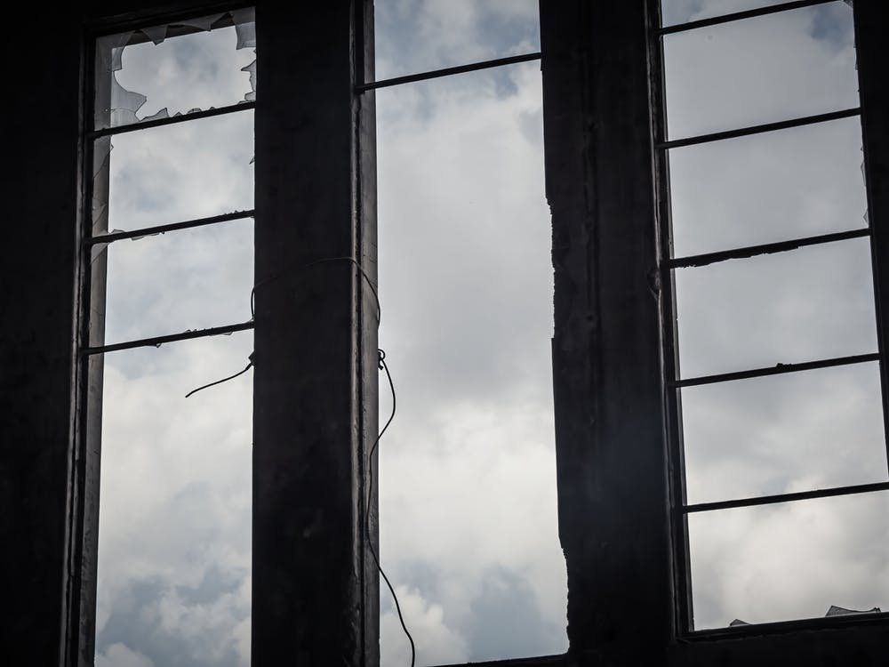 Broken Window In An Abandoned Building 3