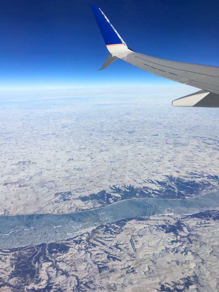 Plane ride over snowy land
