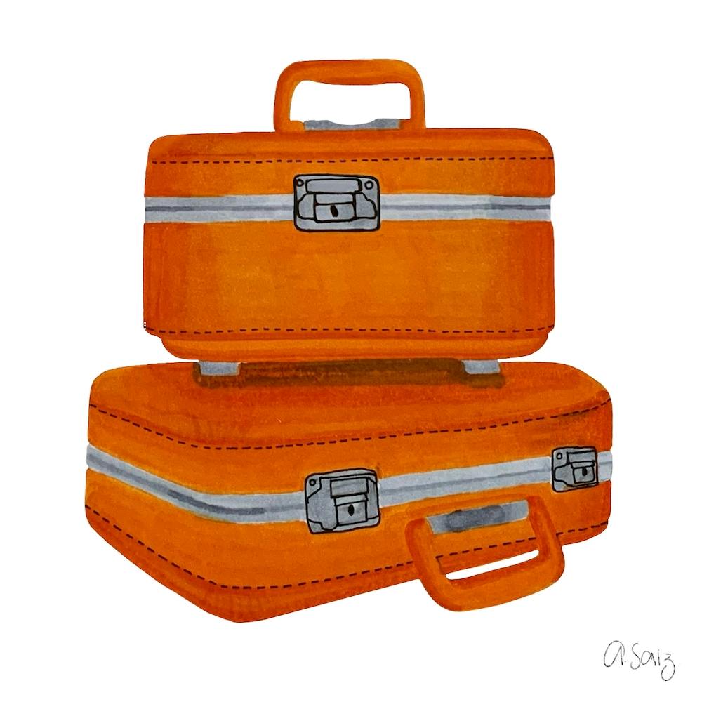 Orangefarbene Koffer