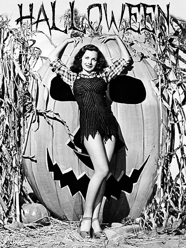 Pin Up Girl Posing In Front Of The Giant Pumpkin