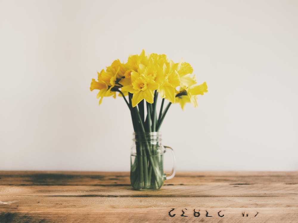 Flowers On Wood Table