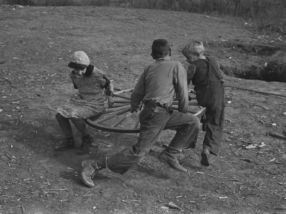 Farm Children Playing On Homemade Merry Go Round, Williams County, North Dakota By Russell Lee