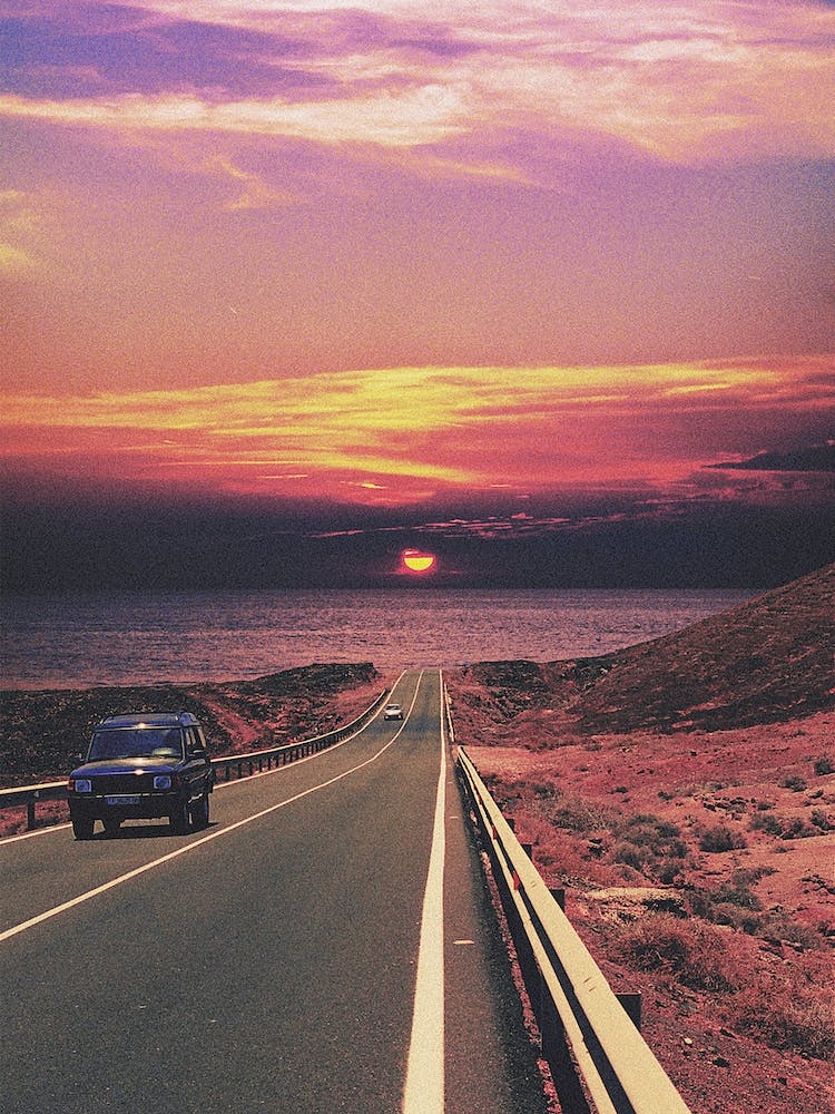 Retro Jeep On The Road At Sunset