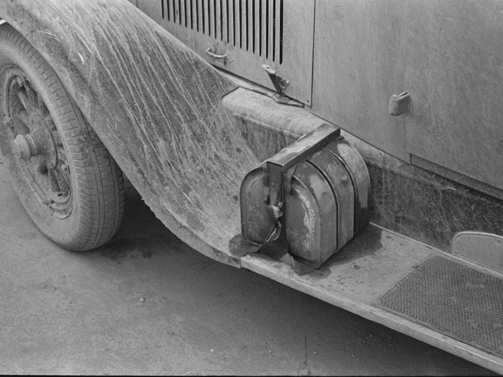 Water, Oil And Gas On Farmer S Car,Williston, North Dakota By Russell Lee