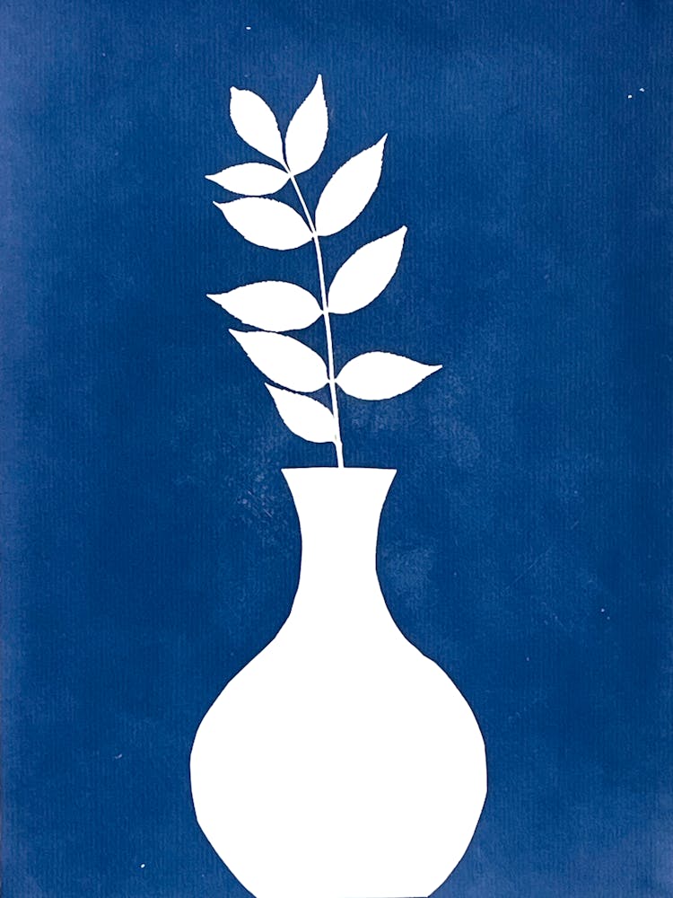 White Vase With Leaf