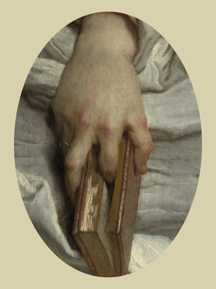 Hand Holding A Book
