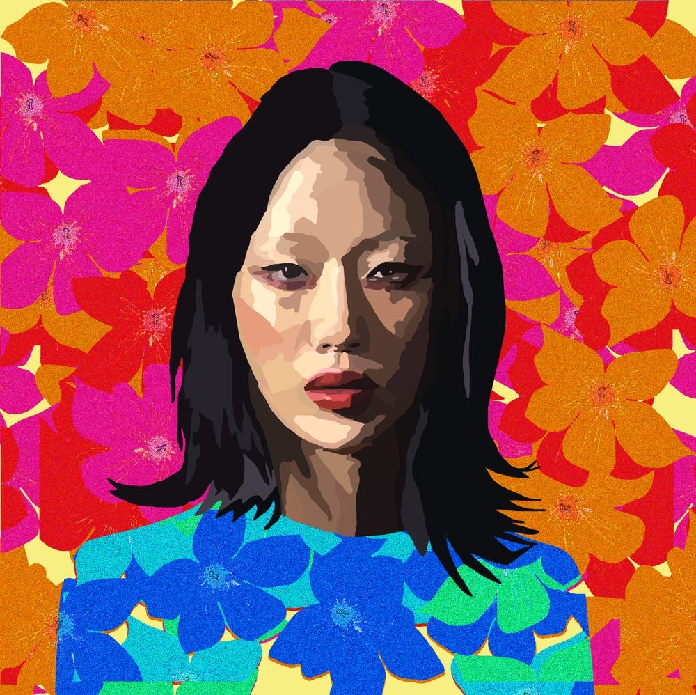 Asian Woman With Flowers