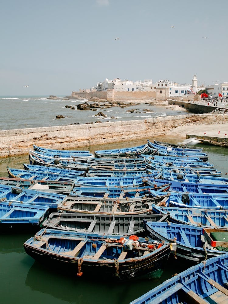 Blue Fishing Boats In The Harbor of Essaouira Morocco