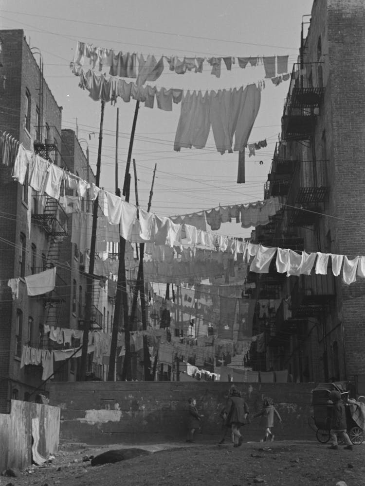 An Avenue Of Clothes Washings Between 138th And 139th Street Apartments, Just East Of St, Anne S Avenue, Bronx, New