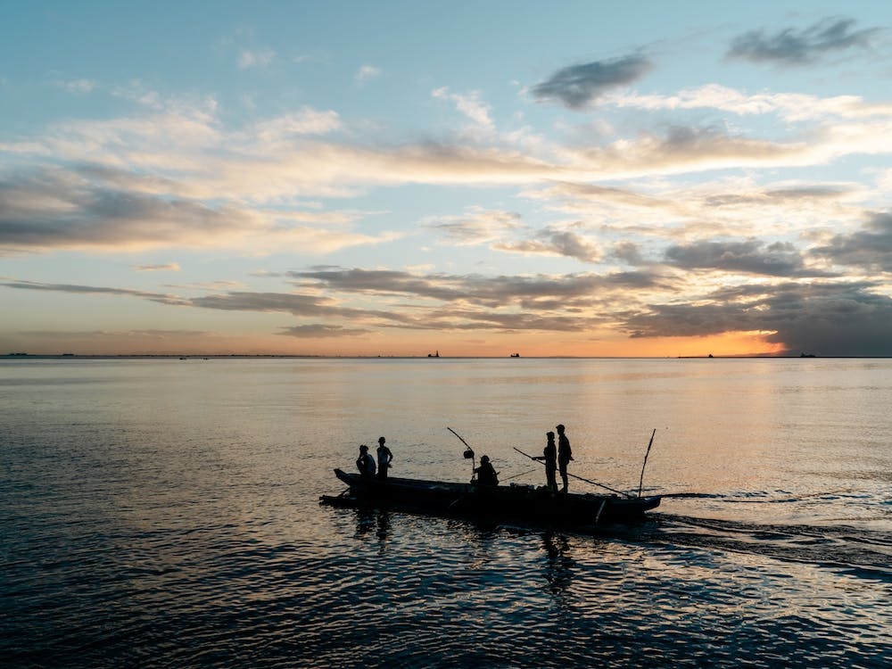 Sunset Fishermen In Manila, Philippines