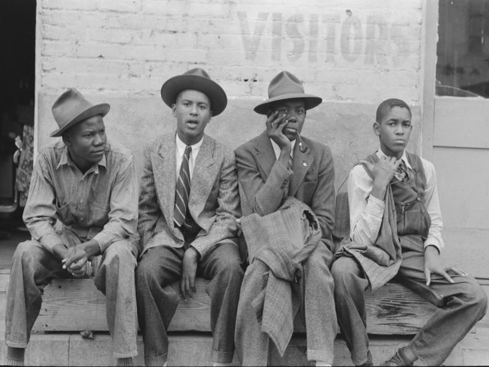 Boys Sitting On Bench On Street, Waco, Texas By Russell Lee