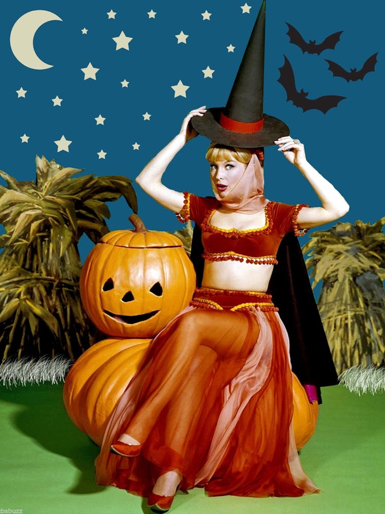 Pinup Witch With Pumpkins And Bats