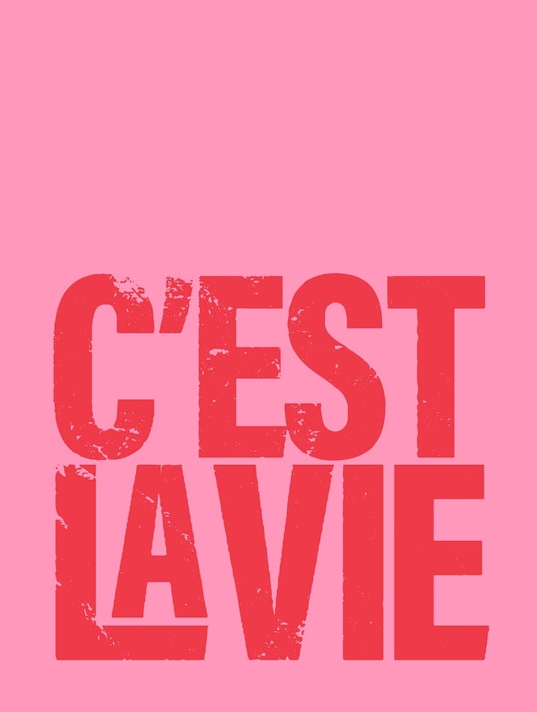 Distressed C'est La vie typography in red and pink